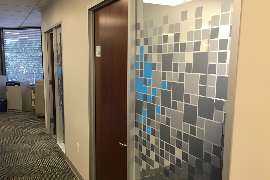 Blue office window graphics for way-finding and privacy